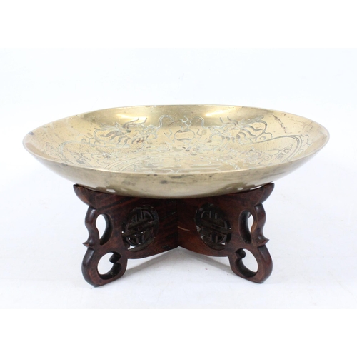 40 - Chinese brass incense bowl on carved hardwood base, 36cm wide.