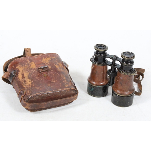 51 - Pair of early 20th century field binoculars in leather case.