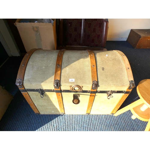 212 - Large canvas covered doom top travel trunk.