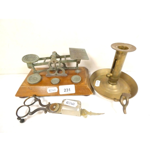 231 - Set of postage scales, brass chamber stick, wick trimmers etc.