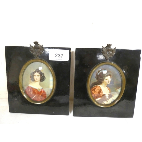 237 - Two small miniature portrait pictures in ebonised frames.