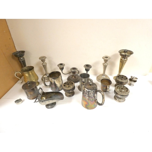 251 - Large collection of metalware to include candlesticks, tankards etc.