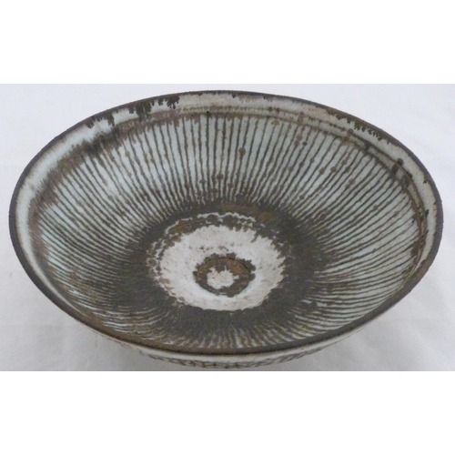 255 - Dame Lucie Rie DBE (Austrian, 1902 - 1995)Studio pottery drip glazed bowl, the interior and exterior... 