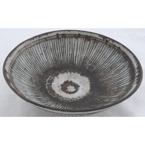 255 - Dame Lucie Rie DBE (Austrian, 1902 - 1995)Studio pottery drip glazed bowl, the interior and exterior... 