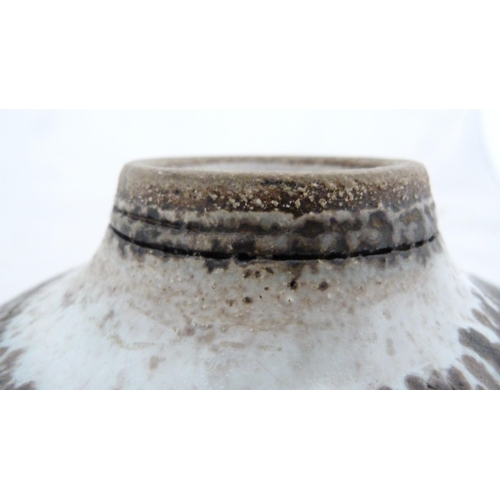 255 - Dame Lucie Rie DBE (Austrian, 1902 - 1995)Studio pottery drip glazed bowl, the interior and exterior... 
