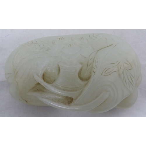 315 - Chinese celadon jade carving of a recumbent kylin, Qing Dynasty, on a padouk stand, 9cm, and another... 