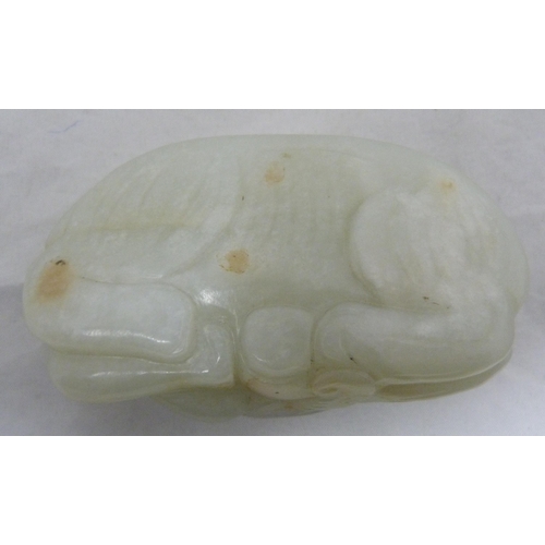 315 - Chinese celadon jade carving of a recumbent kylin, Qing Dynasty, on a padouk stand, 9cm, and another... 