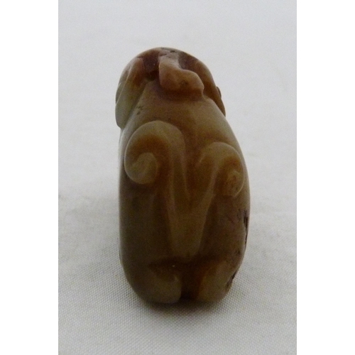 315 - Chinese celadon jade carving of a recumbent kylin, Qing Dynasty, on a padouk stand, 9cm, and another... 