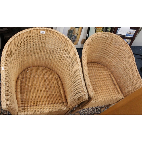 585 - Pair of wicker conservatory chairs.