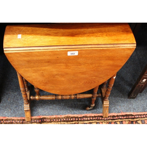 592 - Drop leaf Sutherland table.