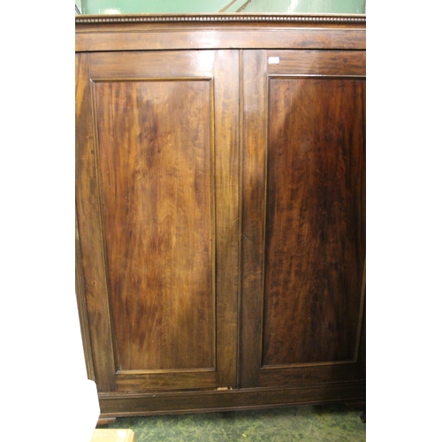 667 - Victorian mahogany two door wardrobe with dental work cornice and bracket supports, 55cm wide x 188c... 