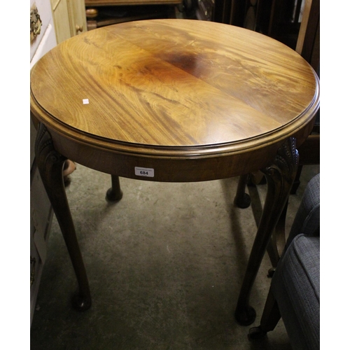 684 - Mahogany round top occasional table on pad feet.