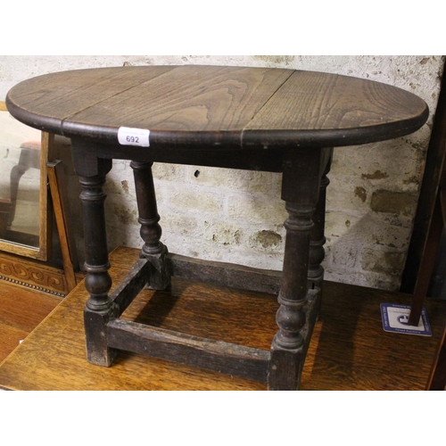 692 - Oak drop leaf occasional table.