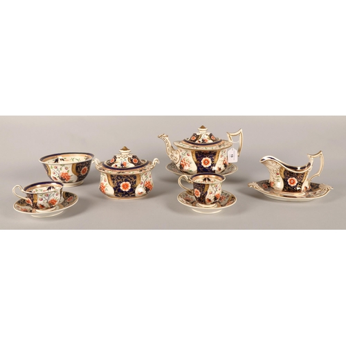 19 - Imari pattern hand painted tea set to include teapot, teacups sugar bowl etc