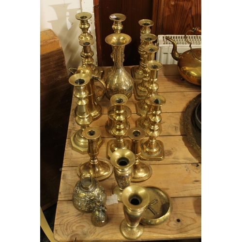 107 - Late 19th century and early 20th century brass candlesticks and other brassware.