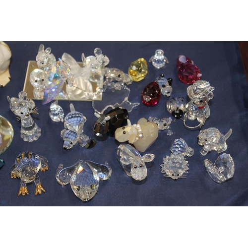 135 - Beswick model of a duck with ladybird, and glass animal models.