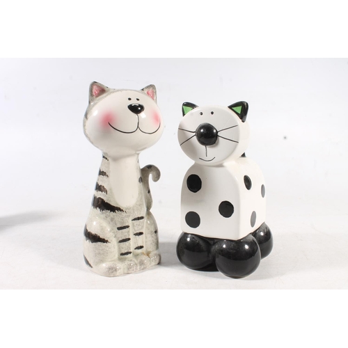 76 - Five ceramic Modern Art cat models.