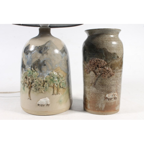 79 - Scottish Studio Pottery Arran Pottery lamp base decorated with trees and sheep, 28cm high to top of ... 