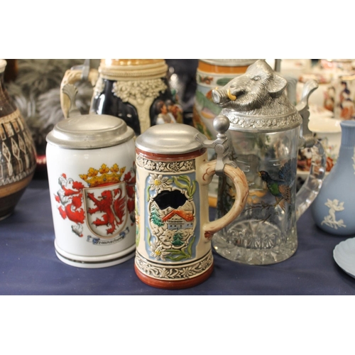 85 - Five German steins to include a Gerz stein decorated with fish, a glass stein with game bird and ani... 