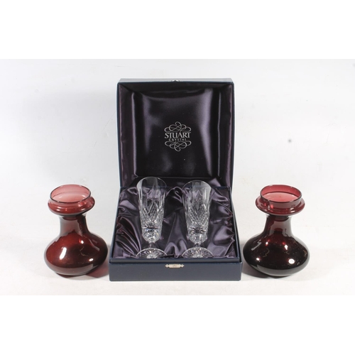 86 - Pair of late Victorian hyacinth bulb vases and a pair of Stuart Crystal champagne flutes, boxed.