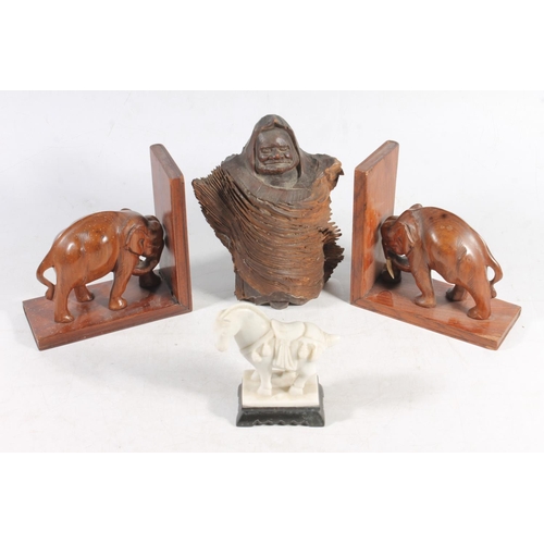 89 - Pair of carved wooden elephant bookends, a Chinese style horse model, and a Folk Art carved wooden f... 