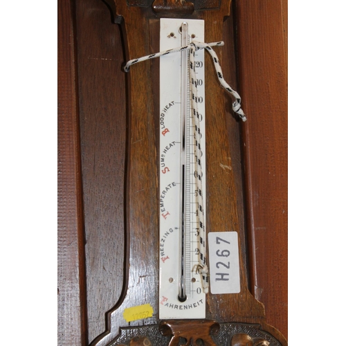 58 - Carved oak barometer.