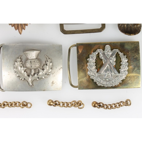 388 - Militaria to include a Royal Scots waist belt buckle, Scottish regiments waist belt buckle, copper h... 