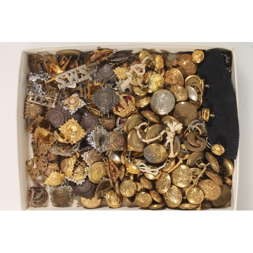 390 - Two trays of military buttons, shoulder pips and crowns etc.