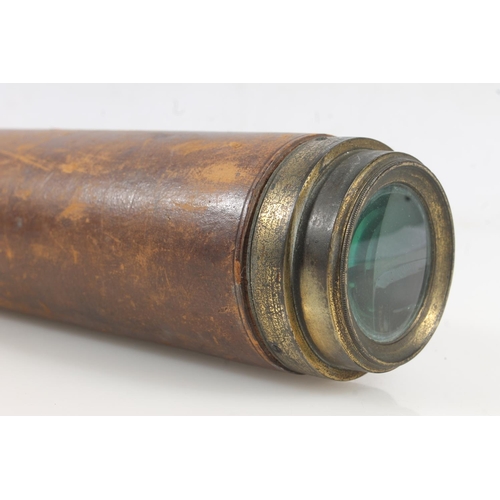 396L - Antique brown leather bound single draw telescope inscribed 'Dolland Day & Night', 90cm long whe... 