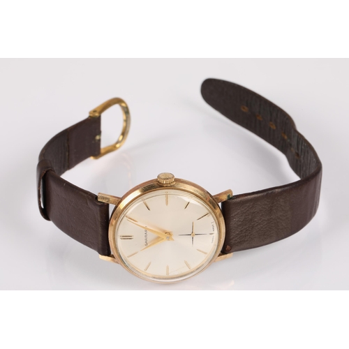 76 - Garrard yellow metal wristwatch on leather strap