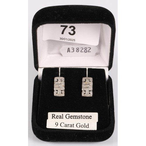 73 - Pair 9ct gold stud earrings set with diamond chips, 2.7g