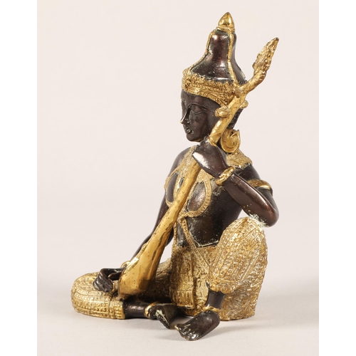 233 - Mixed metal Thai figure playing an instrument,  14cm h.