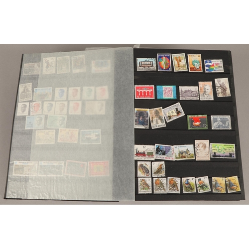 260 - Assortment of five stamp albums, to include Belgium, Dubai Great Britain, Ethiopia etc.