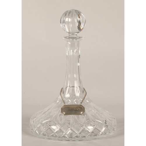 270 - Collection of four cut glass decanters, one with a wooden stand. (4)