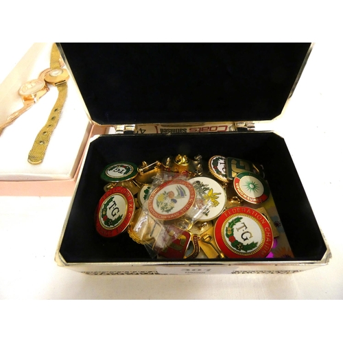 301 - Box of pin badges, ladies’ watches.