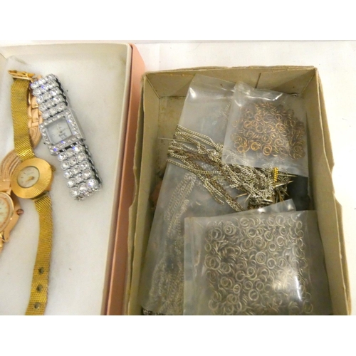 301 - Box of pin badges, ladies’ watches.