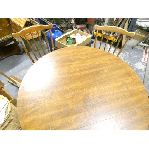 435 - Modern oak country style two seater dining table and two chairs.