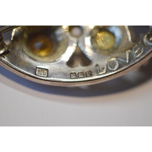 174 - Robert Crerar (Scottish) Silver circular brooch of Celtic shield form with gold and cairngorms, 47mm... 