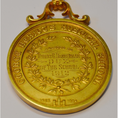120 - George Heriot's Hospital School gold medal, 1912, probably 15ct, engraved to reverse, 34.4g.