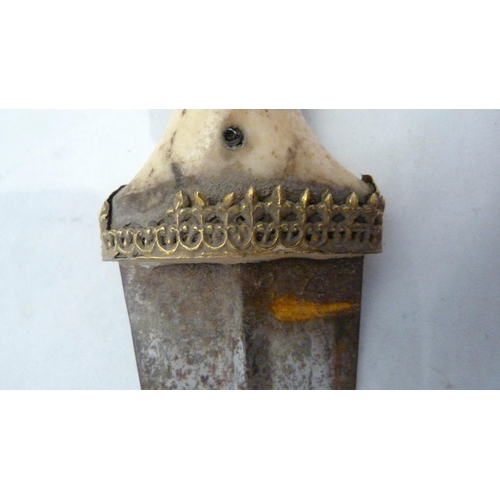 329 - Arabic Jambiya dagger, with bone hilt bearing yellow metal appliques and ruby-coloured jewelled ston... 