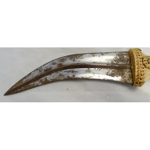 329 - Arabic Jambiya dagger, with bone hilt bearing yellow metal appliques and ruby-coloured jewelled ston... 