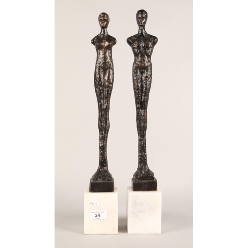 34 - Pair bronzed figures on marble bases, each approx. 53cm h.