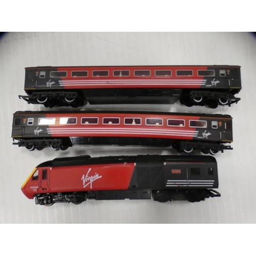 10 - Three Hornby OO gauge Virgin 'Lady in Red' model locos and six carriages.