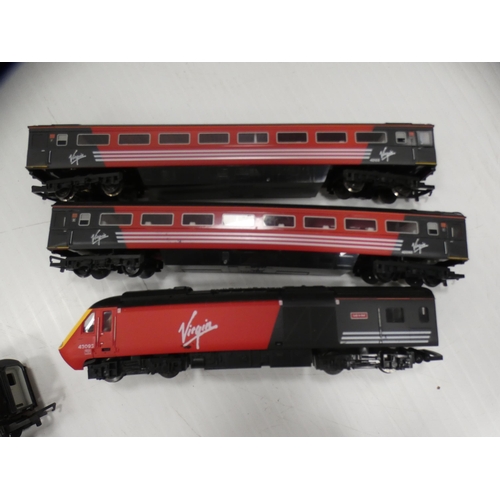 10 - Three Hornby OO gauge Virgin 'Lady in Red' model locos and six carriages.