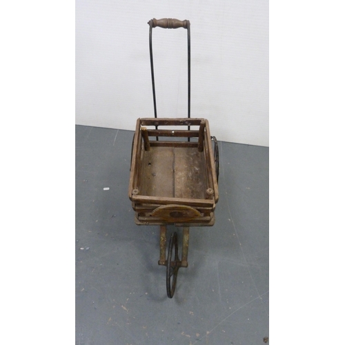 114 - Two vintage doll's prams and a trolley cart.  (3)