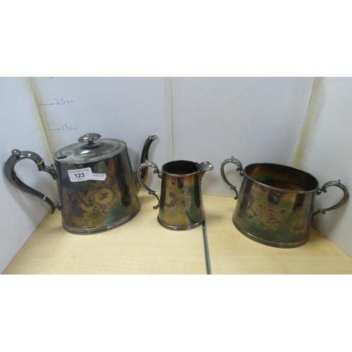 123 - Three-piece EP tea set, tankard, hotel plate water pot and a wine slide etc.