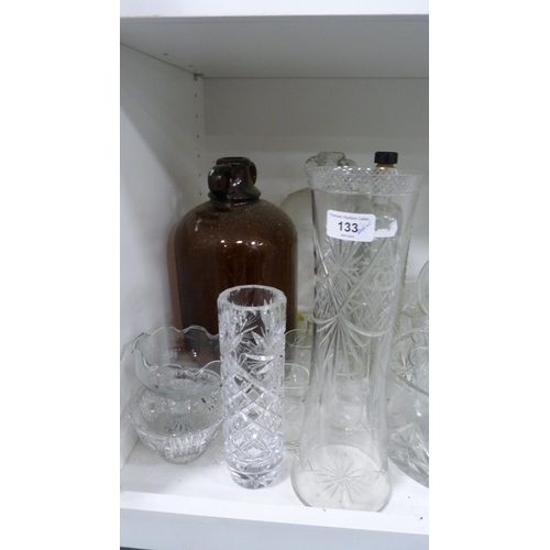 133 - Demi johns, cut glass bowls, vases etc (one shelf).