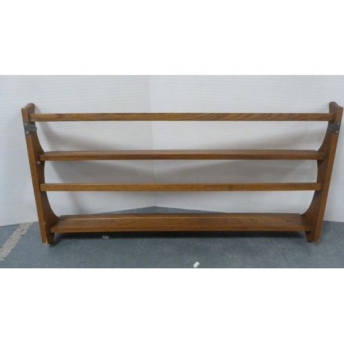 134 - Two Ercol plate racks.