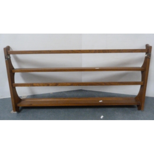 134 - Two Ercol plate racks.