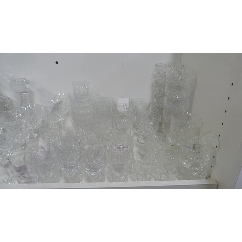 138 - Crystal and glass to include decanters, glasses, bowls, sundae dishes etc (one shelf).